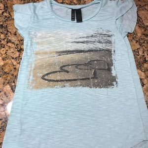 Beautiful pastel blue Top with  heart in sand